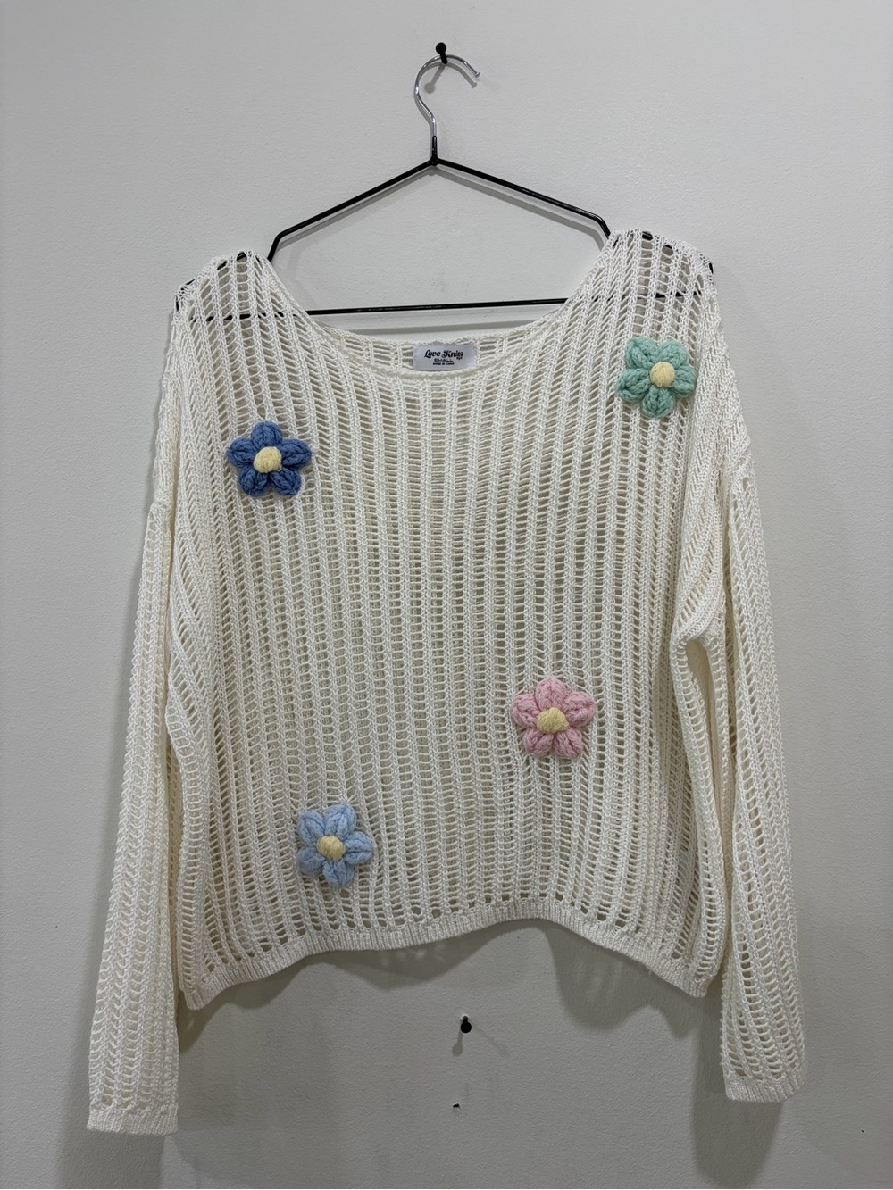Open-Knit Cream Crewneck Sweater with Pastel Flower Appliqués